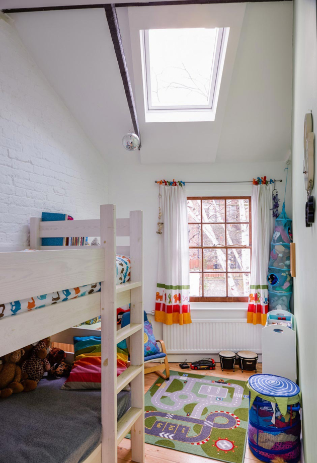 Fortress Grove childrens bedroom with large VELUX roof window