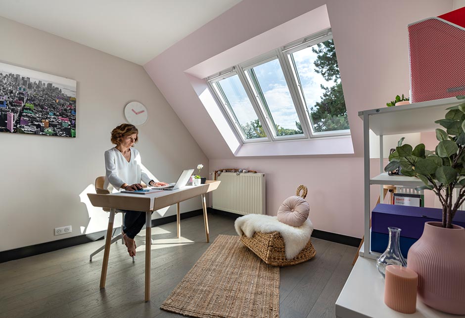 woman working from home in great roof window light
