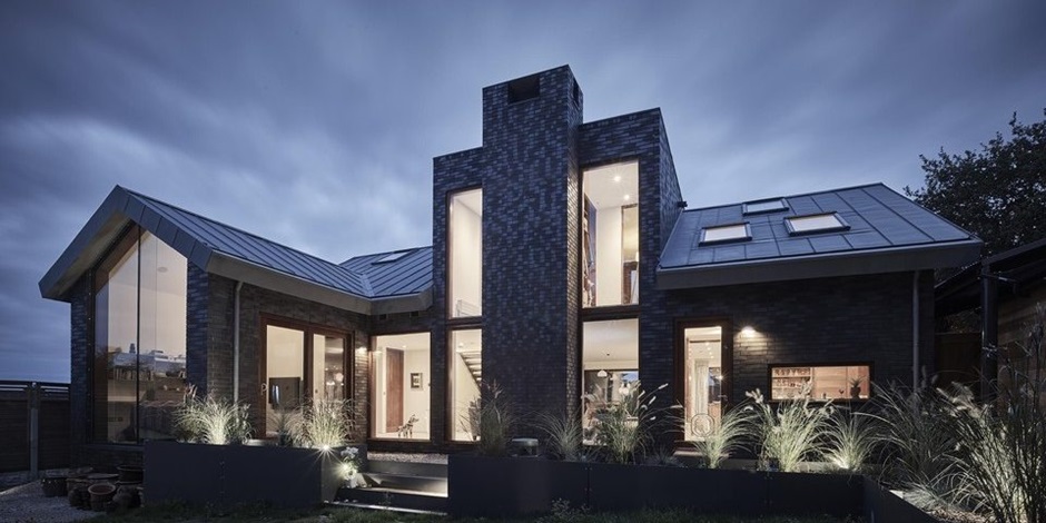 self-build exterior home at dusk