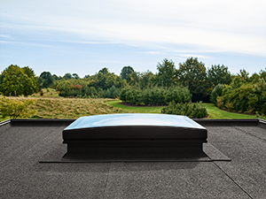 VELUX AMERICA EXPANDS FLAT ROOF PRODUCTS  WITH CURVED GLASS AND ROOF ACCESS SKYLIGHTS