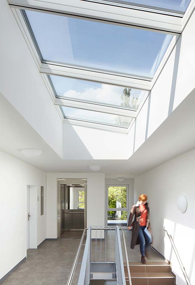 Rooflight solution in social housing stairwell  VELUX Modular Skylights - Longlight 5-30°, Hamm, Germany