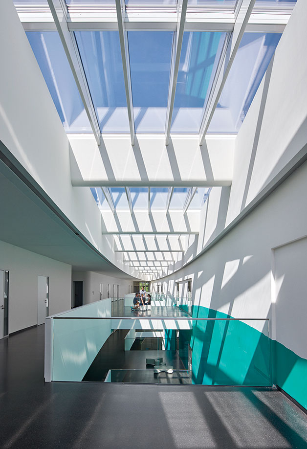 Atrium glazing with modular skylights | VELUX Longlight/Ridgelight